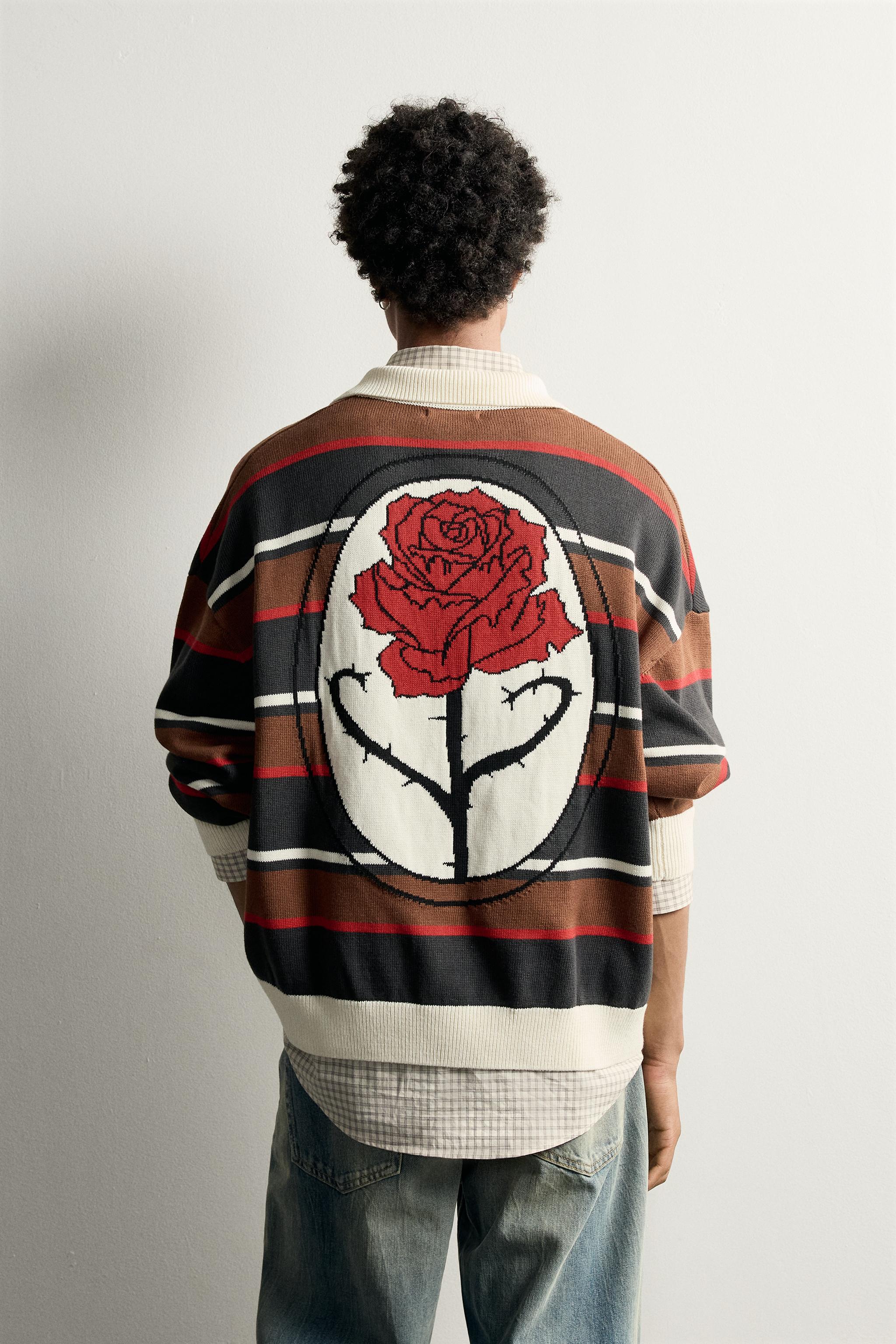 POLO EN MAILLE À RAYURES ET INTARSIA FLEUR